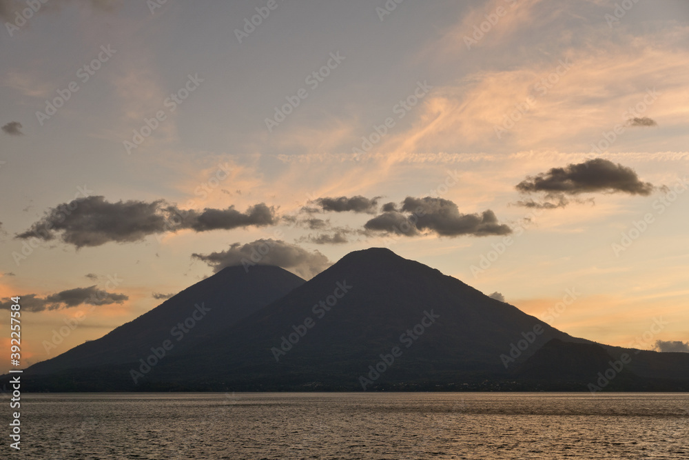 Guatemala, Central America: sunset at lake Atitlán (Atitlan) with volcanos Atitlan and 
Toliman