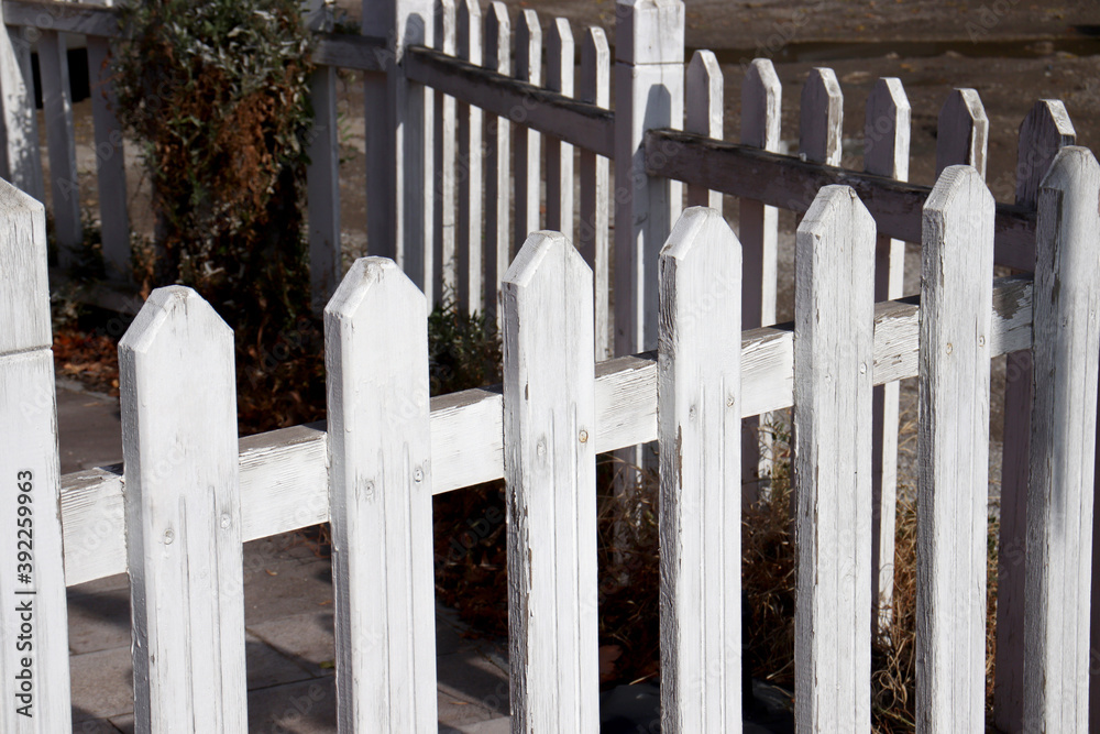 old white wooden picket fence