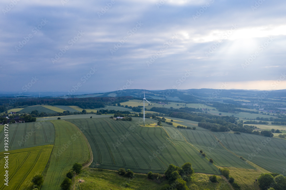 Drone panorama over landscape and wind turbine in Germany