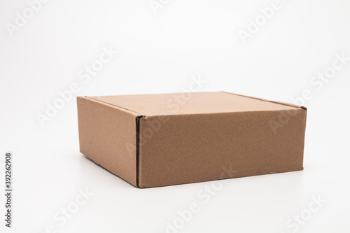 Cardboard Carry Box for Products On White Background Isolated © papii