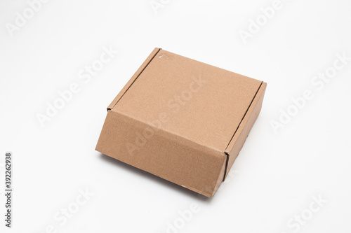 Cardboard Carry Box for Products On White Background Isolated © papii