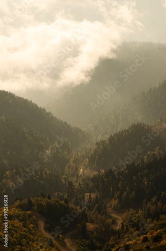 Sunset in the mountains at Roza Pik  height 2320 meters. View from the trekking trail Rosa Khutor Ski Resort  Sochi  Russia.