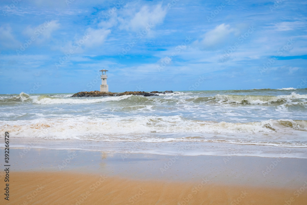 Khao lak lighthouse at Phang Nga Province. Lighthouse located in the middle of the sea, Hightlight of Nang Thong Beach. There are beautiful rocks sparsely, soft white sand.