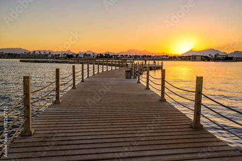 Wooden Pier on Red Sea in Hurghada at sunset  View of the promenade boardwalk - Egypt  Africa