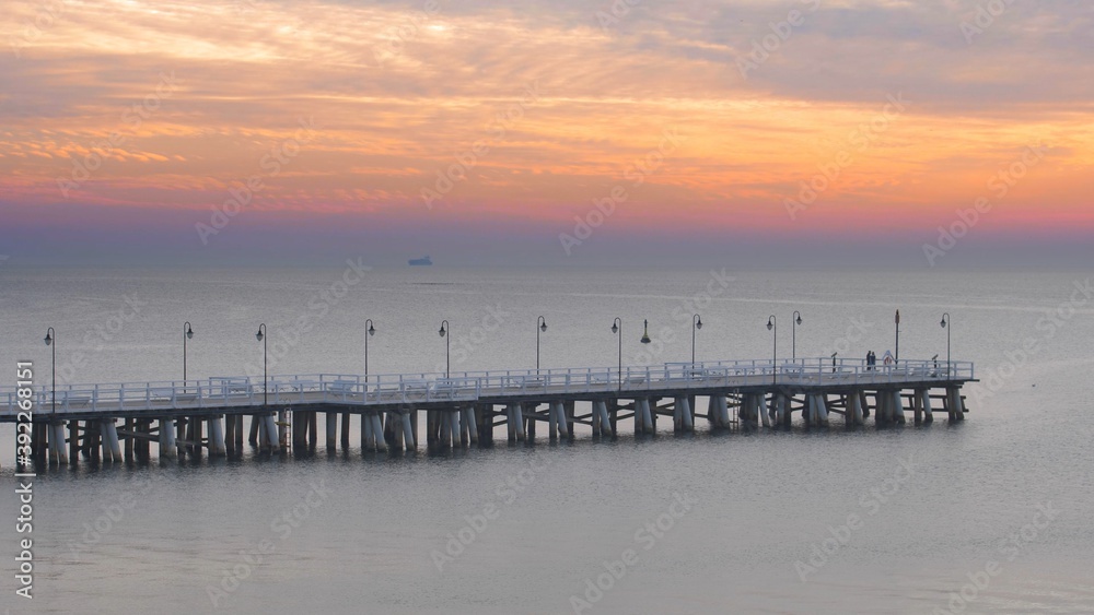 Wooden Pier on Baltic Sea in Gdynia Poland at Sunrise Minimalistic View