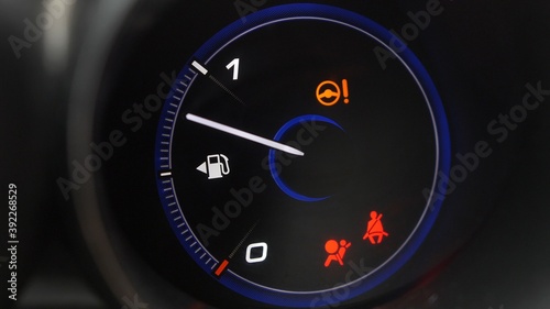 Fuel Gauge and Indicator Lights of Starting and Stopping Car Close Up