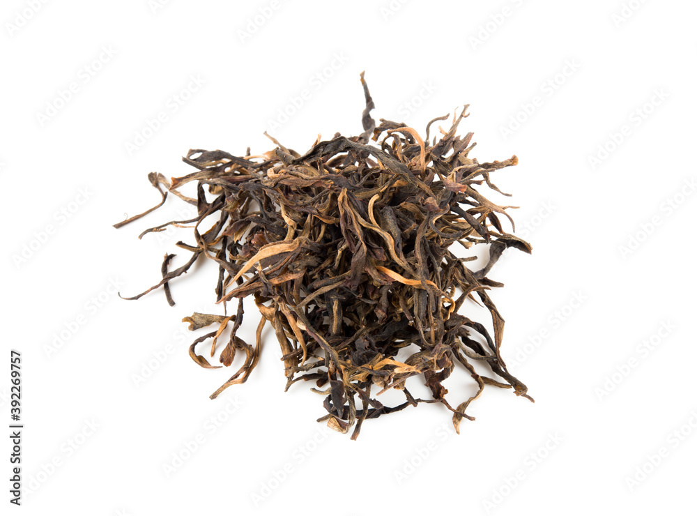 pile of dry chinese tea on white pile of dry chinese tea on white