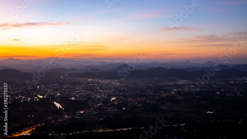 City surrounded by mountains at sunset  Phu Bo Bit view point  Loei  Thailand  Oct 26  2020.