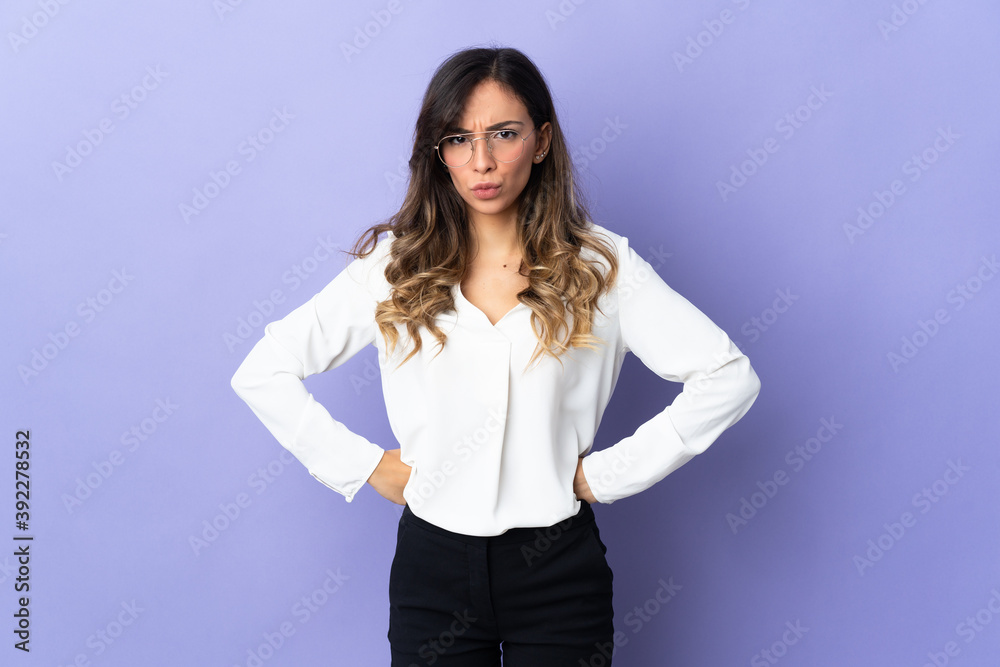Young caucasian woman isolated on purple background angry Young caucasian woman isolated on purple background angry