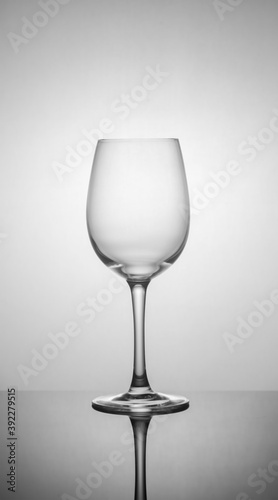 .empty drink glasses on dark background with back light