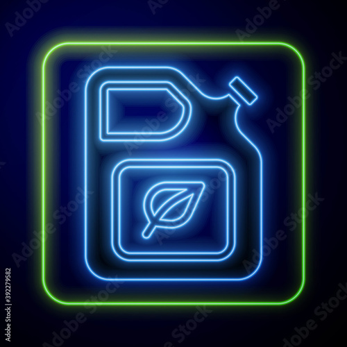 Glowing neon Bio fuel canister icon isolated on blue background. Eco bio and barrel. Green environment and recycle. Vector.
