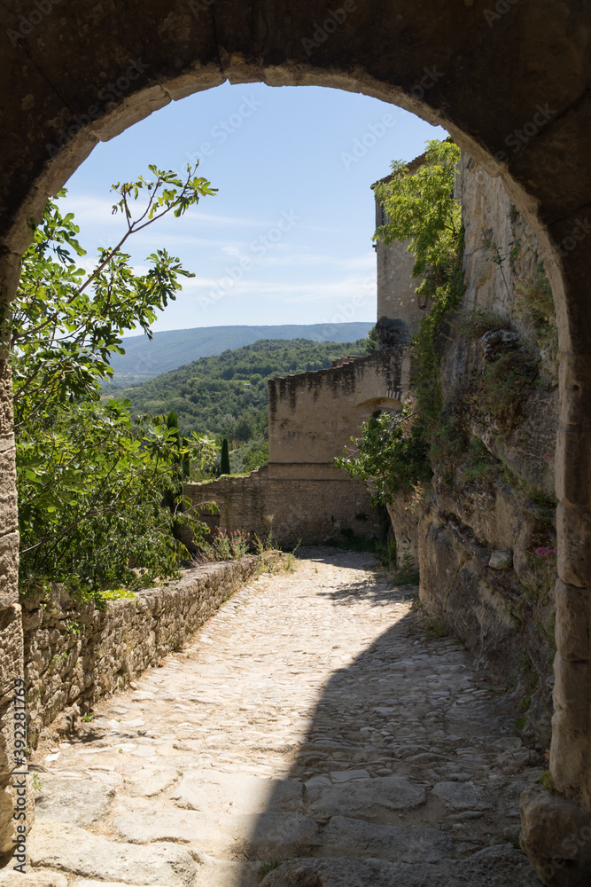 Alley in a Provencal village of the Luberon Alley in a Provencal village of the Luberon