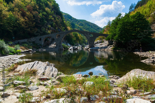 Devil s Bridge - an ancient stone bridge over the Arda River near Ardino Town  Bulgaria  Europe