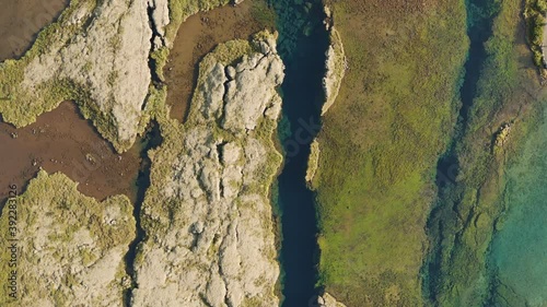 Aerial: Silfra popular diving / snorkeling fissure in Iceland between Eurasian and North American tectonic plates Thingvellir national park Phenomenal water clarity