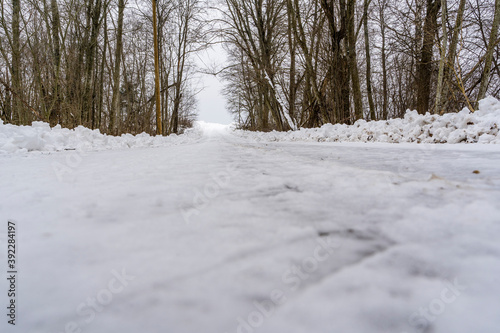 Winter Scene on Countryside Road Covered with Snow