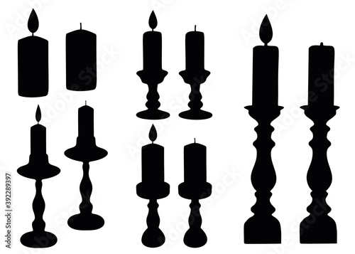 Candles and candlesticks in a set.