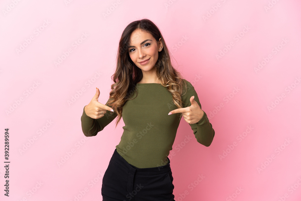 Young caucasian woman isolated on pink background proud and self-satisfied Young caucasian woman isolated on pink background proud and self-satisfied