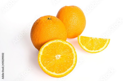 Fresh juicy oranges isolated on white background, Orange fruit isolated on white background, Isolated oranges, Ripe orange isolated on white background. with clipping path.