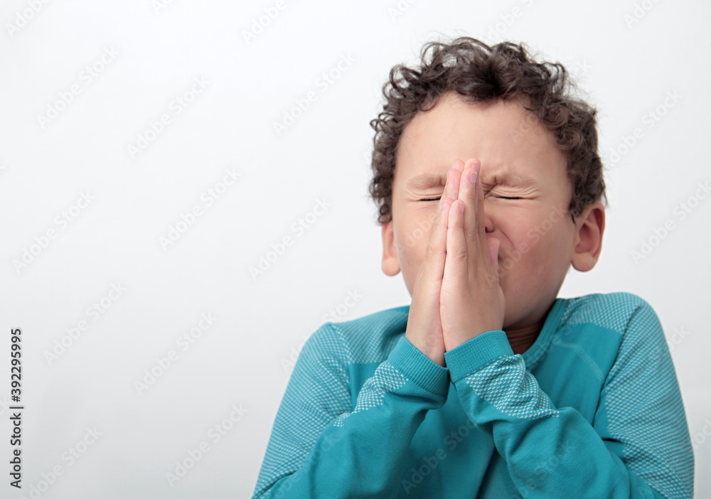 boy praying to god with hands together stock photo boy praying to god with hands together stock photo