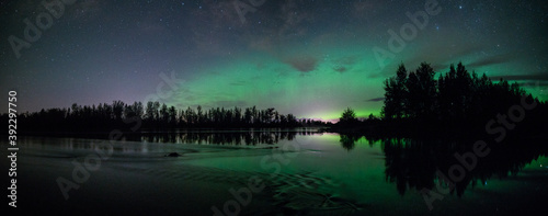 Aurora over water in Alaska.