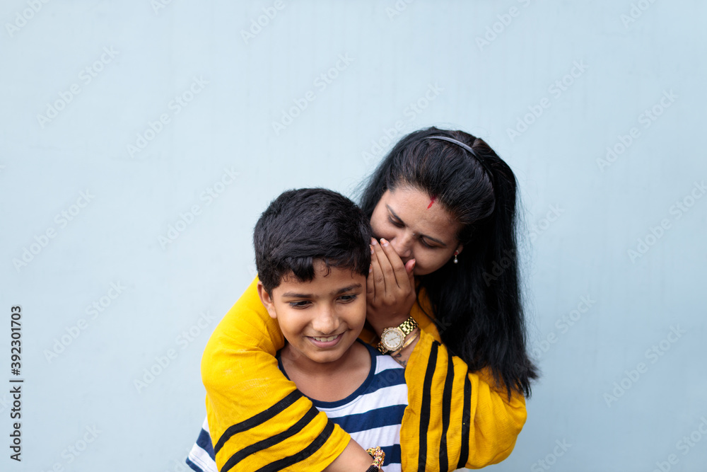 Mother and son sharing cheerful moment together Mother and son sharing cheerful moment together
