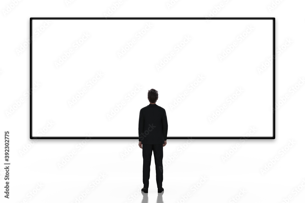 Business man looking at large blank screen or billboard on white background, rear view Business man looking at large blank screen or billboard on white background, rear view