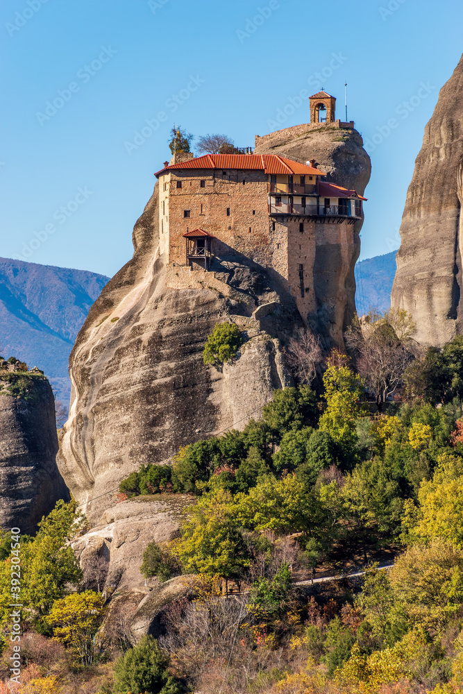 Agios Nikolaos monastery, an unesco world heritage site,  located on a unique rock formation  above the village of Kalambaka during fall season.