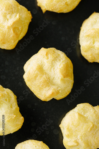 Close up of profiteroles choux pastry dessert