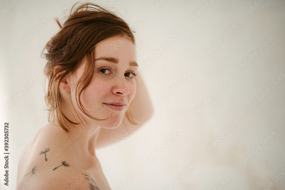 Charming tattooed female bride with cute smile Charming tattooed female bride with cute smile