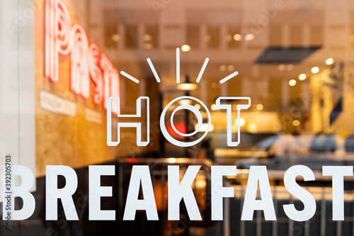 Hot Breakfast sign in a restaurant window