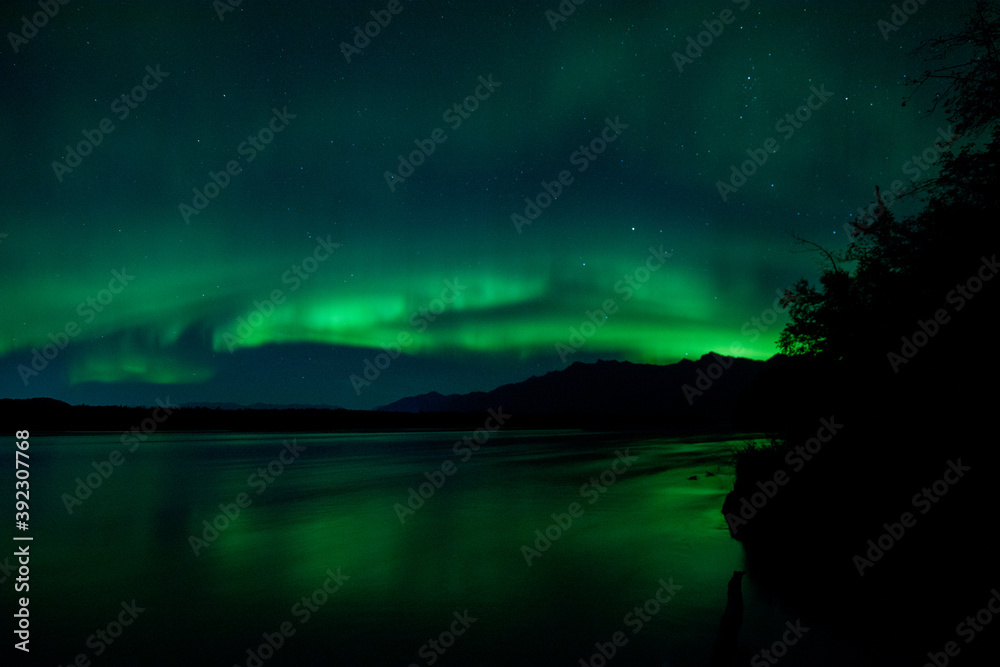 Aurora over Knik River, Alaska.