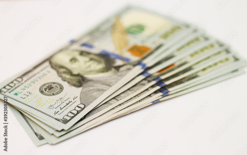 Stacks of paper 100 dollars USA on the white background Stacks of paper 100 dollars USA on the white background