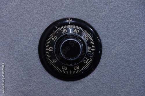 Close up of.the dial of a metal safe photo