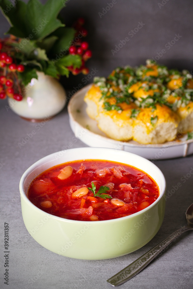 Beetroot soup made with vegetables beans and meat: borsht, bortsch, borshch, borscht. Garlic buns pampushky. Beetroot soup made with vegetables beans and meat: borsht, bortsch, borshch, borscht. Garlic buns pampushky.