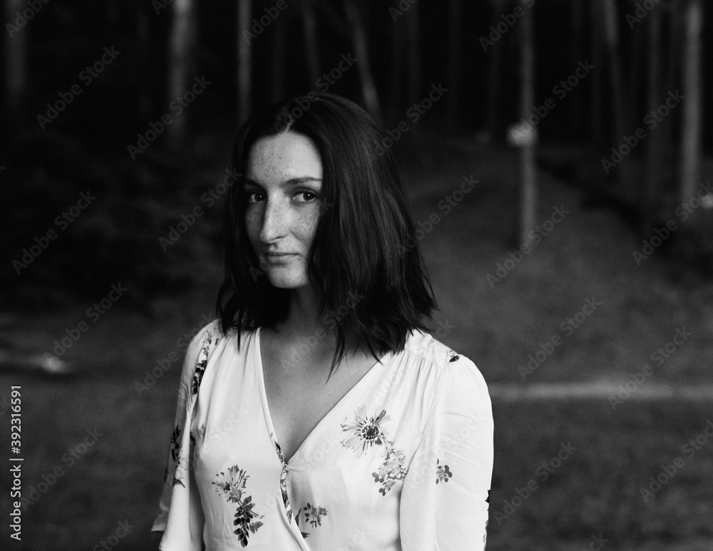 Black and white portrait of a girl with freckles Black and white portrait of a girl with freckles