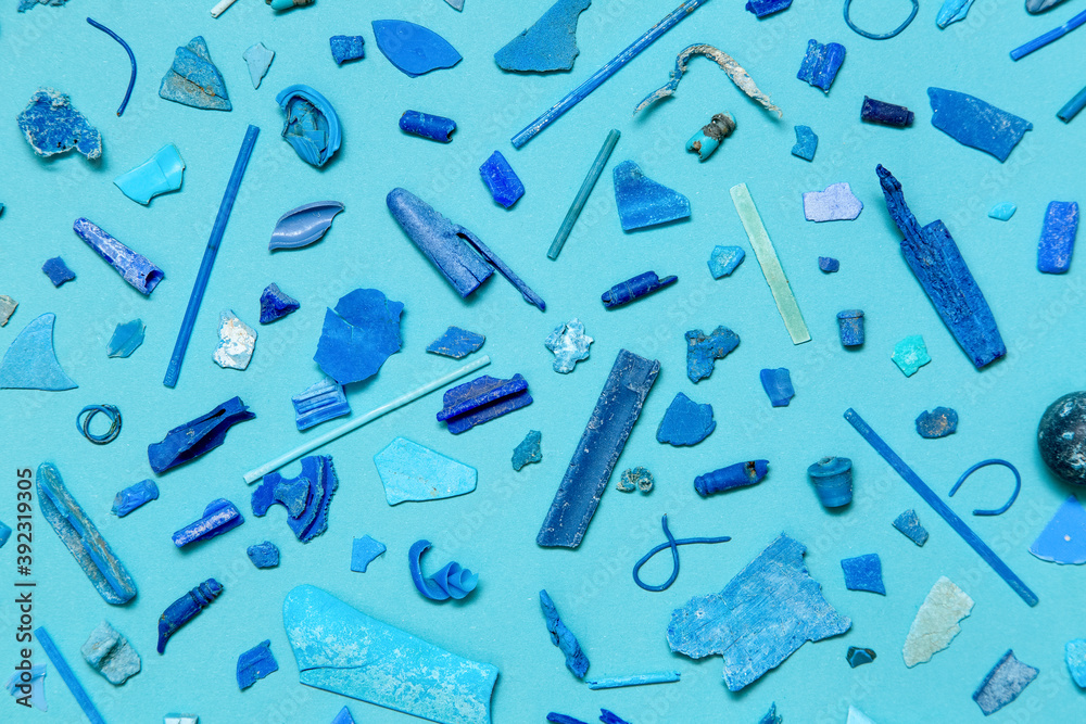 Pieces of blue plastic on the blue background Pieces of blue plastic on the blue background