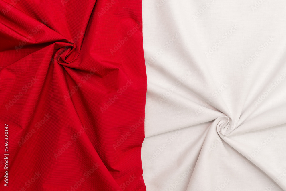 Nylon vs Cotton. Two of a kind. Wrinkled red and white fabrics arranged