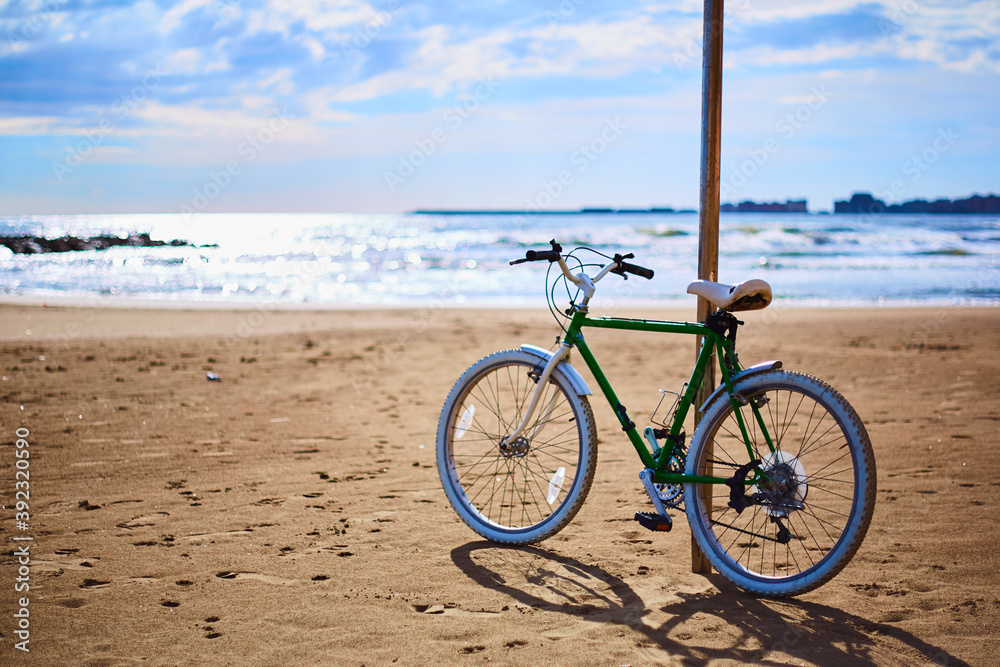 Fototapeta premium bicycle on the beach