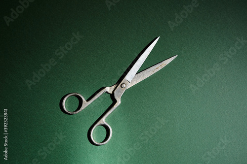 scissors on a green background