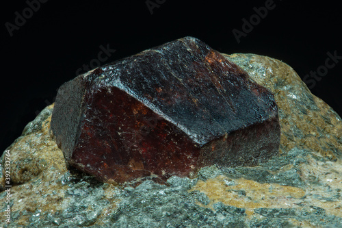 Semiprecious stone corundum ruby in the rock. photo