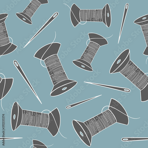 Vector seamless pattern. Hand drawn sewing doodles - black and white spools of thread and needles on blue background.