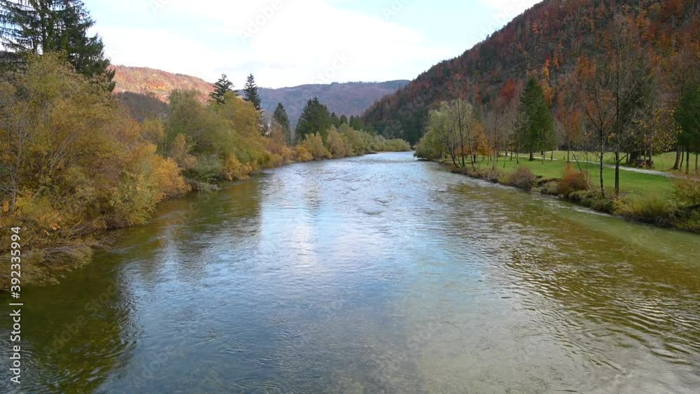 Elevated view of calm Alpine Sava Bohinjka river. Amazing and colorful landscape in Slovenia. Static shot, real time, wide angle Elevated view of calm Alpine Sava Bohinjka river. Amazing and colorful landscape in Slovenia. Static shot, real time, wide angle