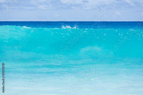 Turquoise and deep blue color waves of indian ocean, in Seychelles