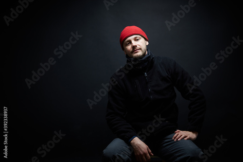 Portrait of a person, red hat