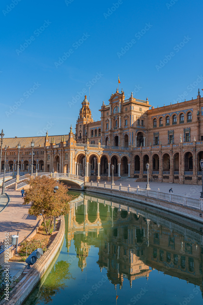 The Plaza de Espana, Spain Square, in Seville, Andalusia, Spain. It is located in the Parque de Maria Luisa, vertical