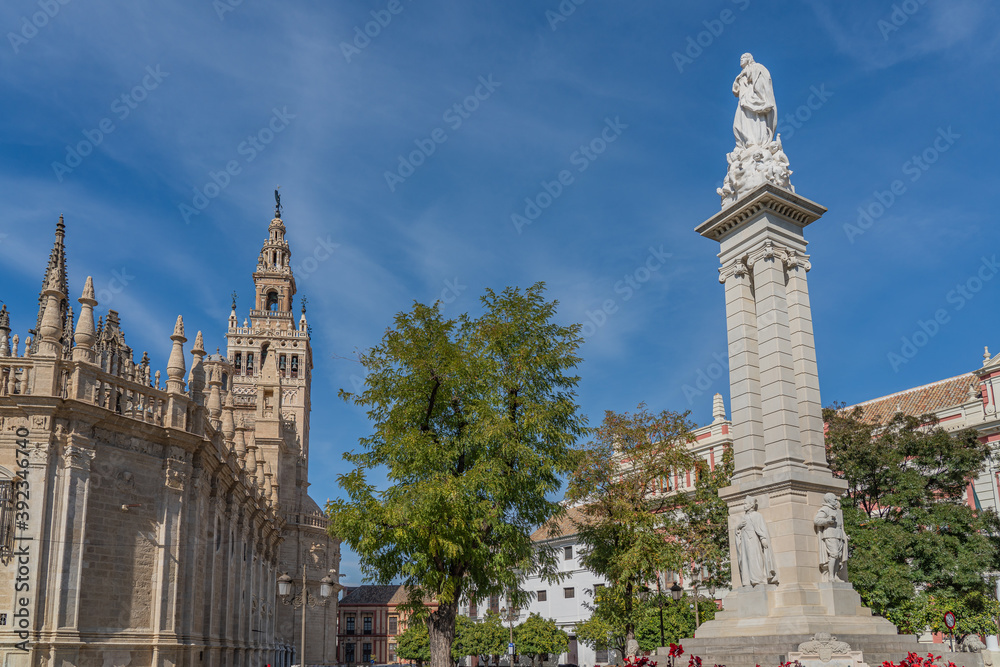 Plaza del Triunfo at the Cathedral of Saint Mary of the See in Seville, Gothic cathedral, with the skulpture