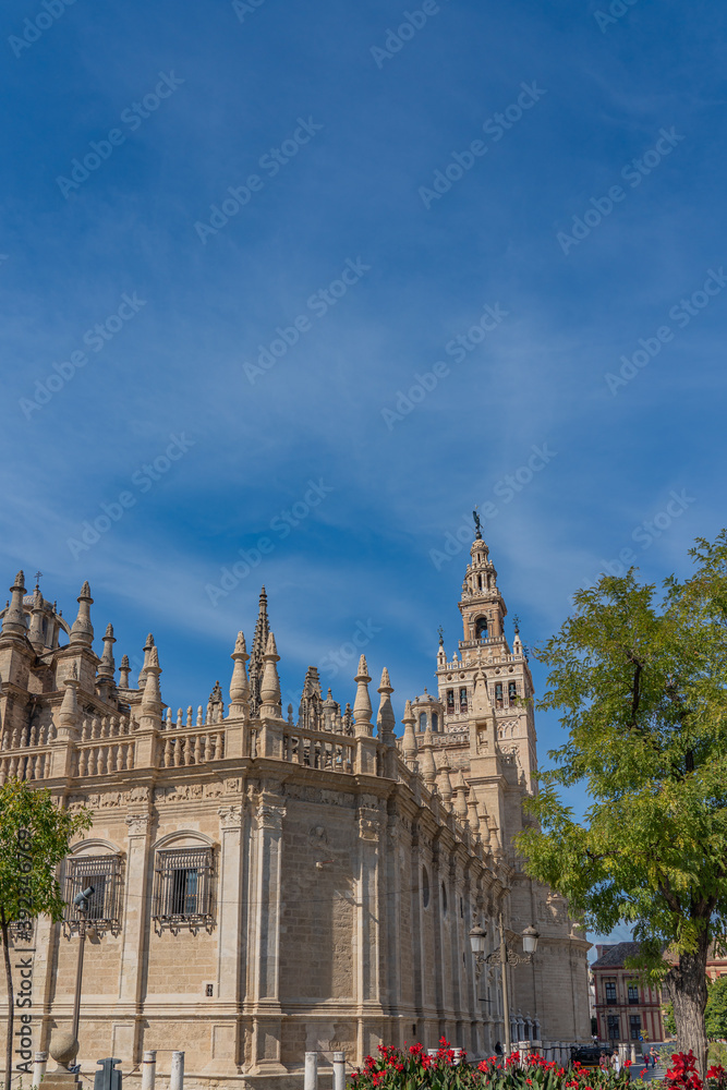 The Cathedral of Saint Mary of the See in Seville, Gothic cathedral, Unesco Word Heritage Site. vertical