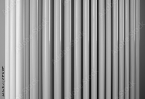 Black and white abstract image of a radiator pipes. Perspective