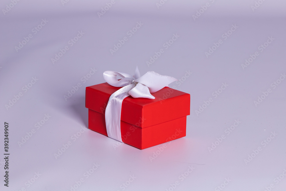 Gift in a red box with a bow