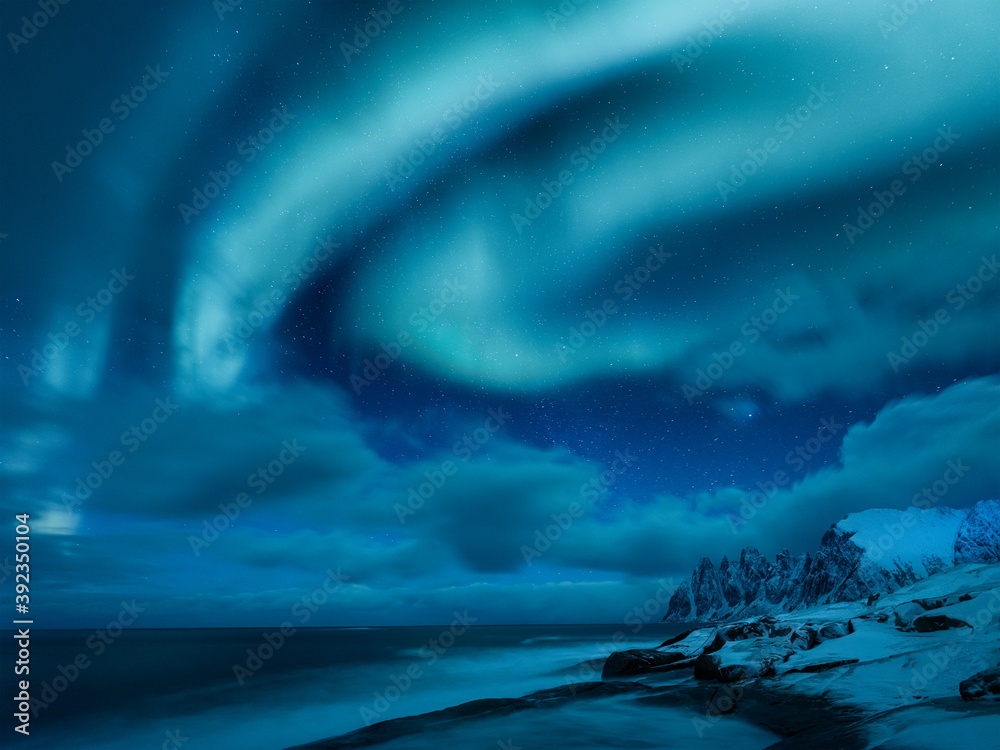 Aurora borealis in Norway. Green northern lights above mountains and ocean. Night winter landscape with aurora. Natural p henomenon background in Norway. - obrazy, fototapety, plakaty 